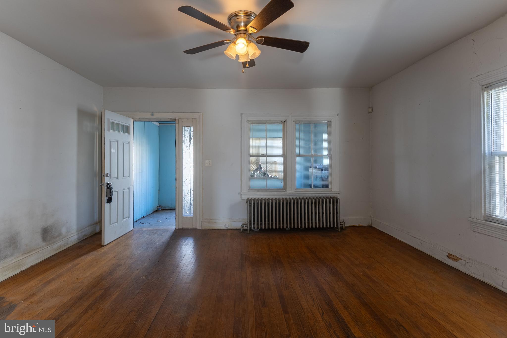 5911 Crown Street Capitol Heights, MD 20743 - Photo 3 of 28 a living room with hardwood floor and a window
