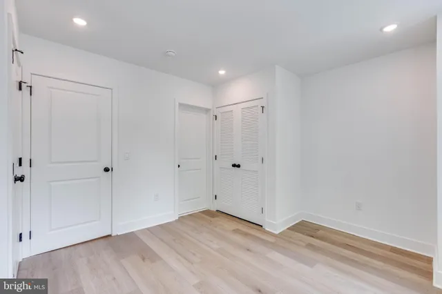 a bathroom with a toilet sink and shower