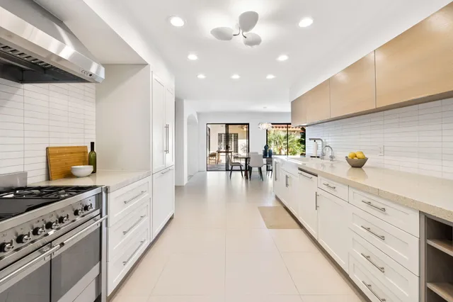 a large kitchen with cabinets