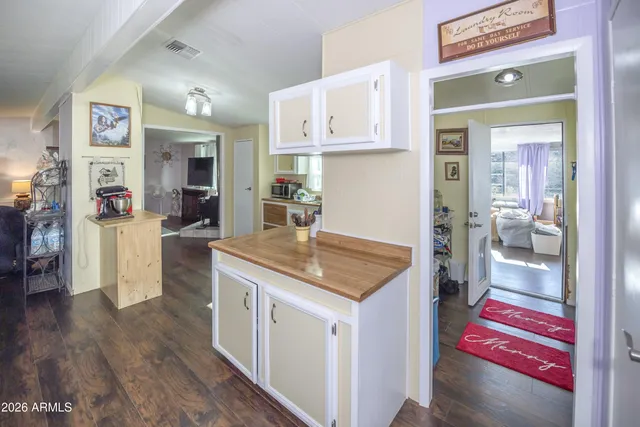 a kitchen with stainless steel appliances granite countertop a stove and a refrigerator