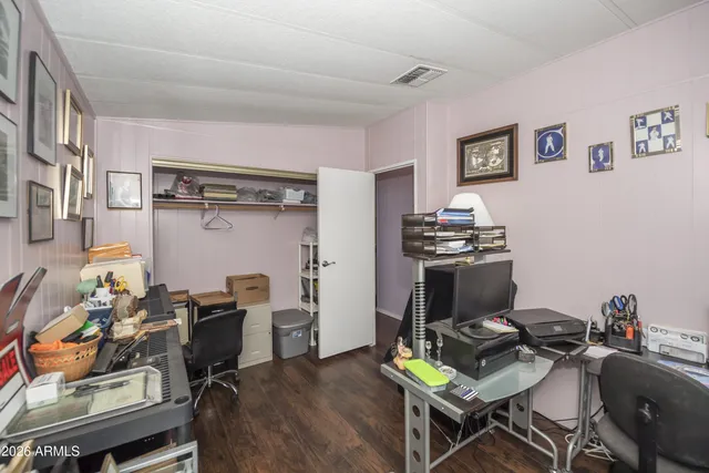 a view of a workspace with furniture