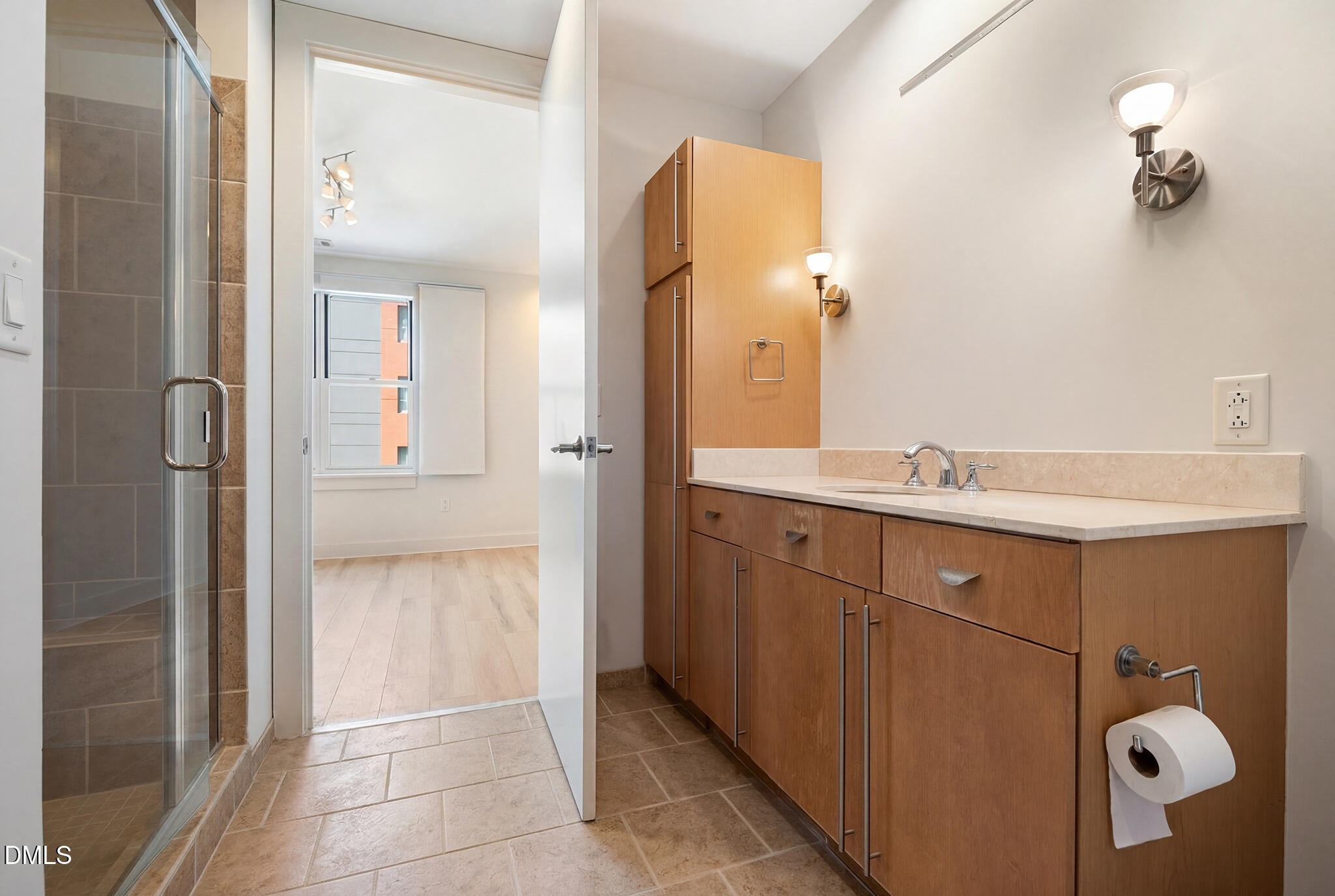 618 North Boylan Avenue, Unit 400 Raleigh, NC 27603 - Photo 16 of 45 a bathroom with a sink and mirror