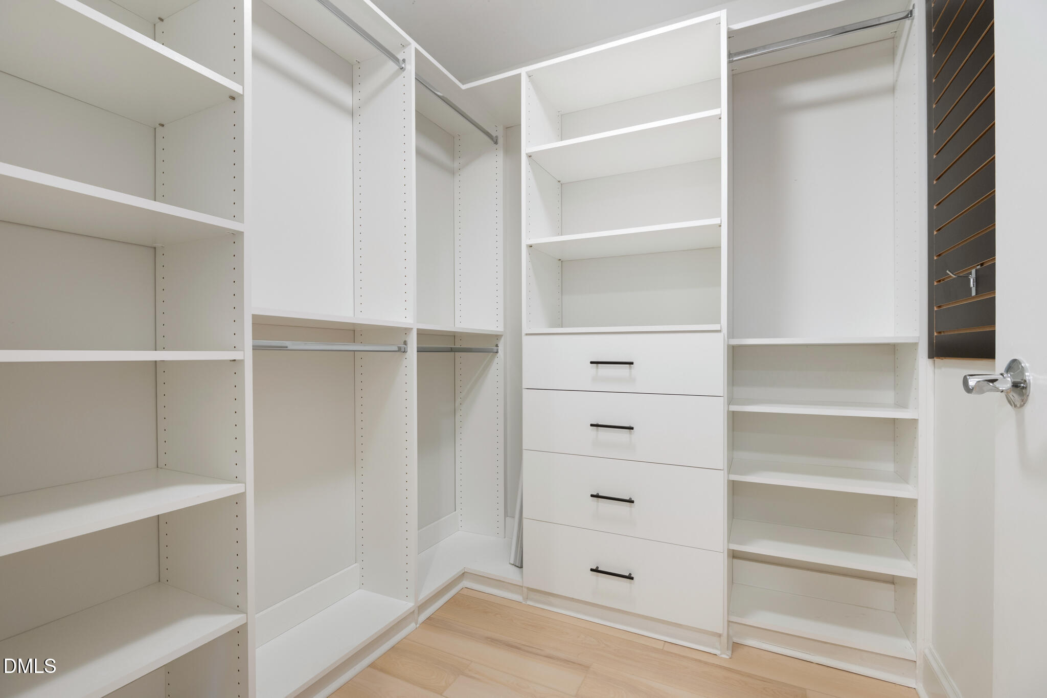 618 North Boylan Avenue, Unit 400 Raleigh, NC 27603 - Photo 24 of 45 a view of walk in closet with empty racks