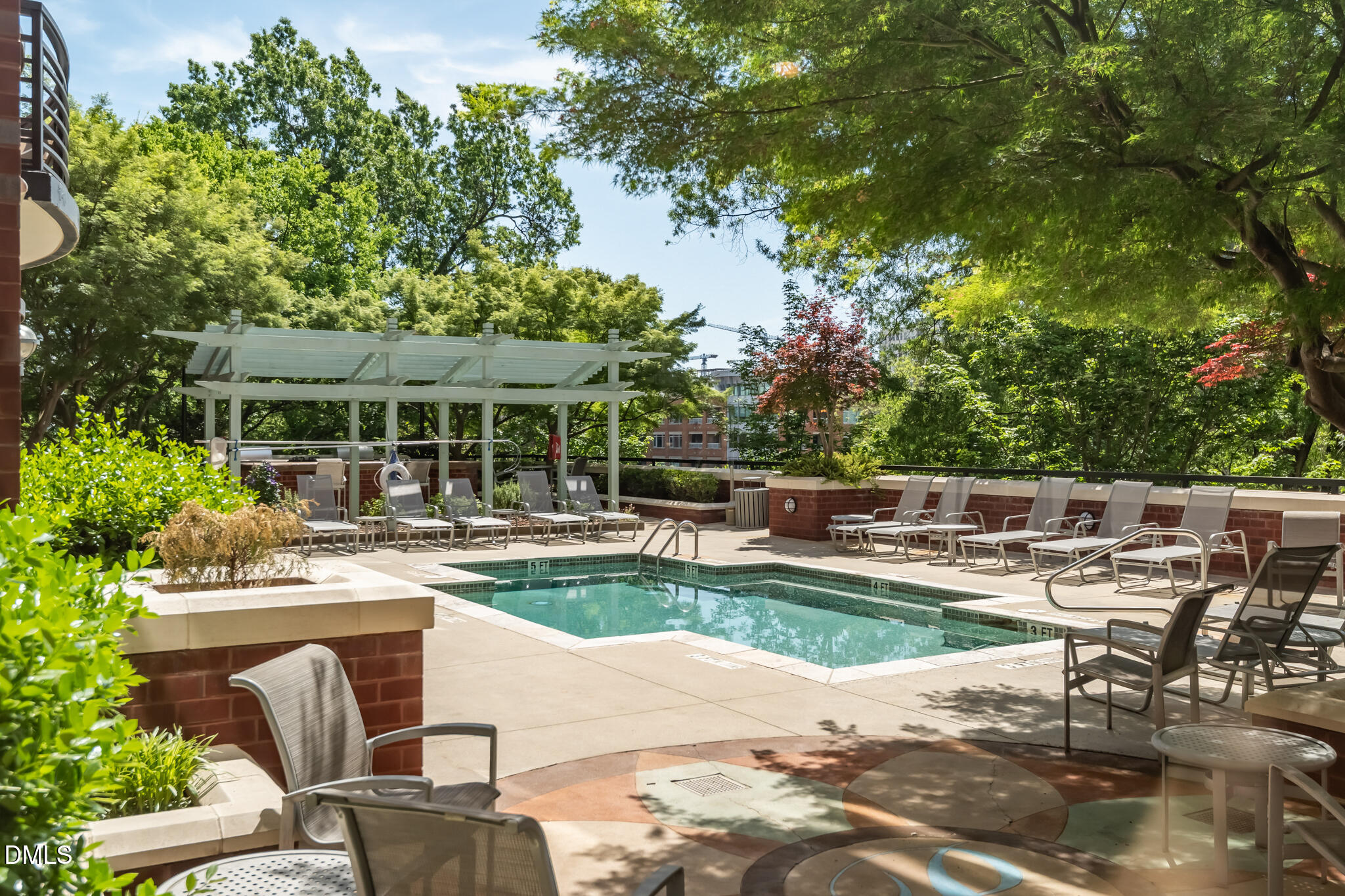 618 North Boylan Avenue, Unit 400 Raleigh, NC 27603 - Photo 37 of 45 a view of a swimming pool with chairs
