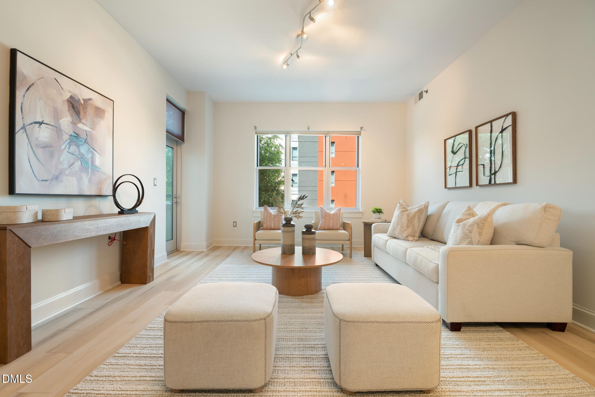 618 North Boylan Avenue, Unit 400 Raleigh, NC 27603 - Photo 3 of 45 a living room with furniture and windows