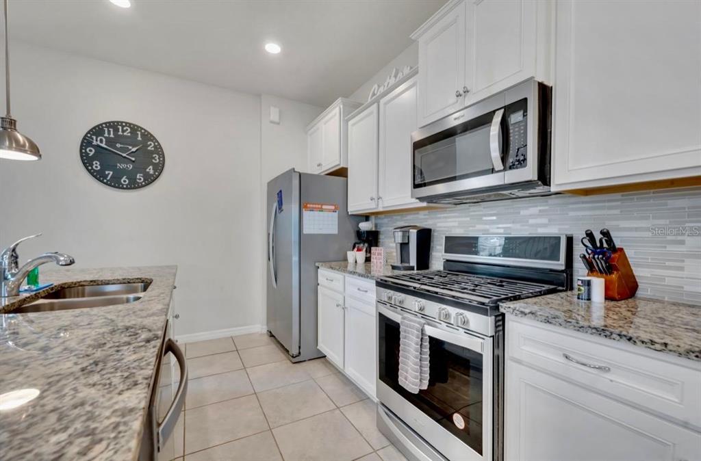 7204 Oakmoss Loop Davenport, FL 33837 - Photo 11 of 80