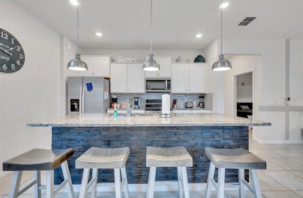 7204 Oakmoss Loop Davenport, FL 33837 - Photo 6 of 80