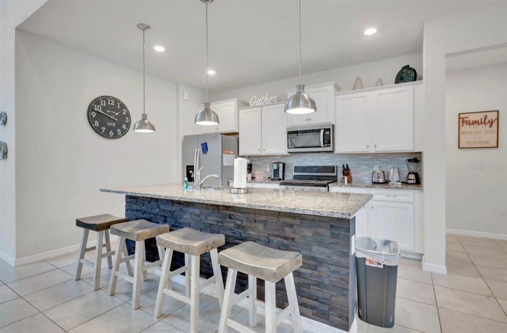 7204 Oakmoss Loop Davenport, FL 33837 - Photo 7 of 80