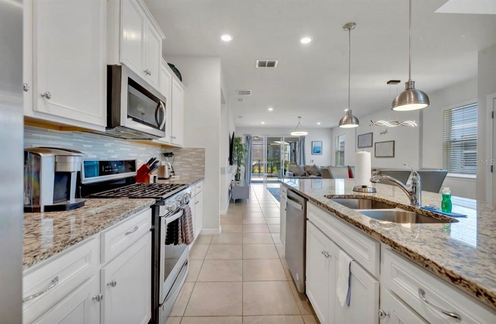 7204 Oakmoss Loop Davenport, FL 33837 - Photo 8 of 80