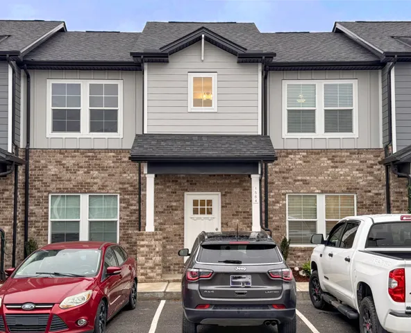 a car parked in front of a house