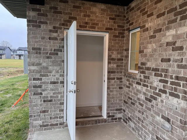 a bathroom with a shower and a sink