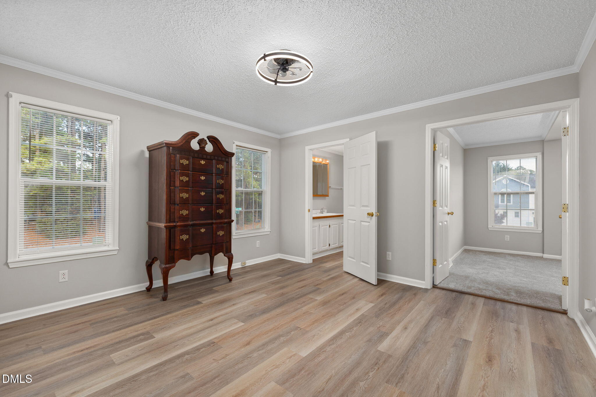 2850 Sanderford Road Raleigh, NC 27610 - Photo 20 of 34 wooden floor and windows in a room with a window