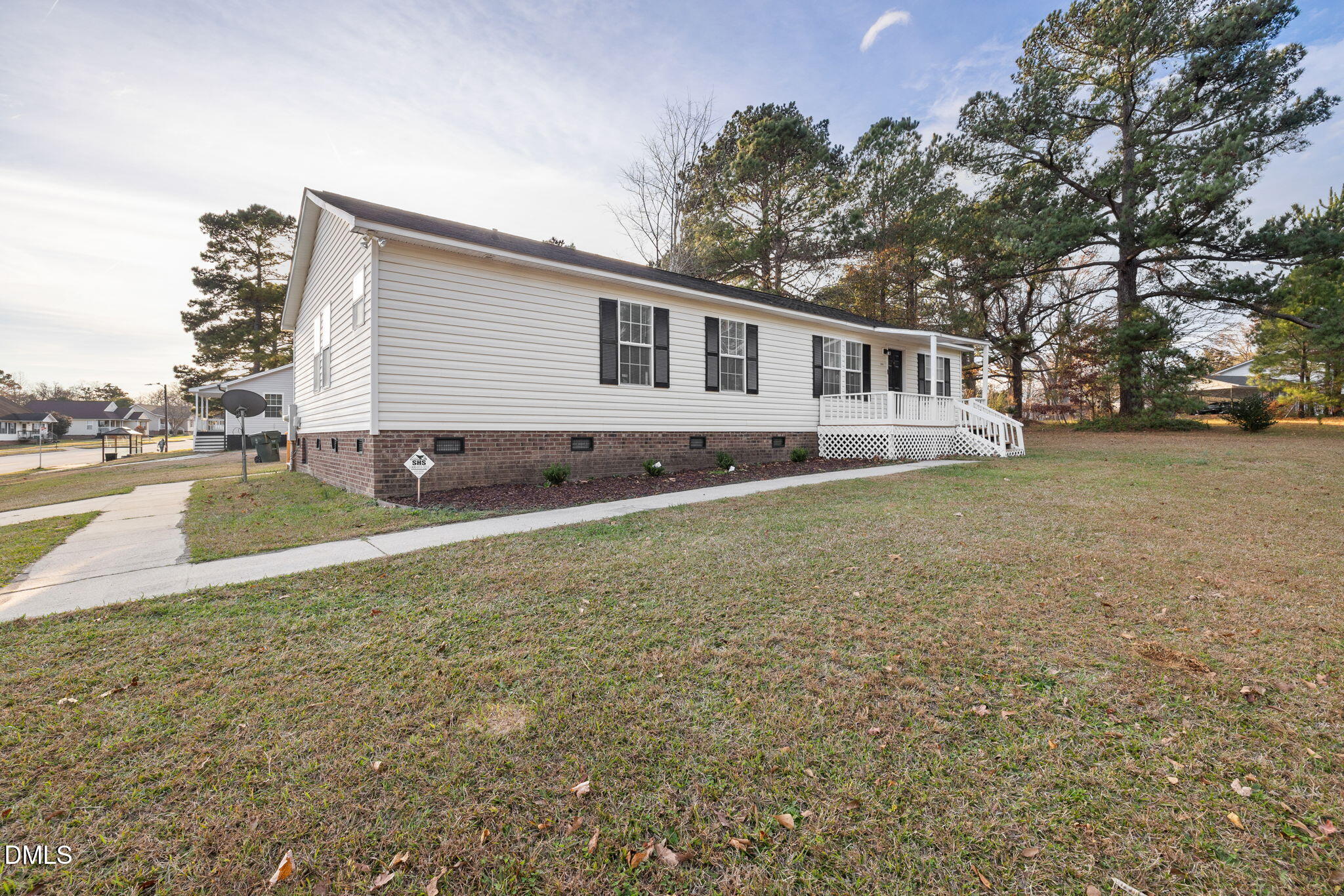 2850 Sanderford Road Raleigh, NC 27610 - Photo 2 of 34 a front view of a house with a yard and swimming pool