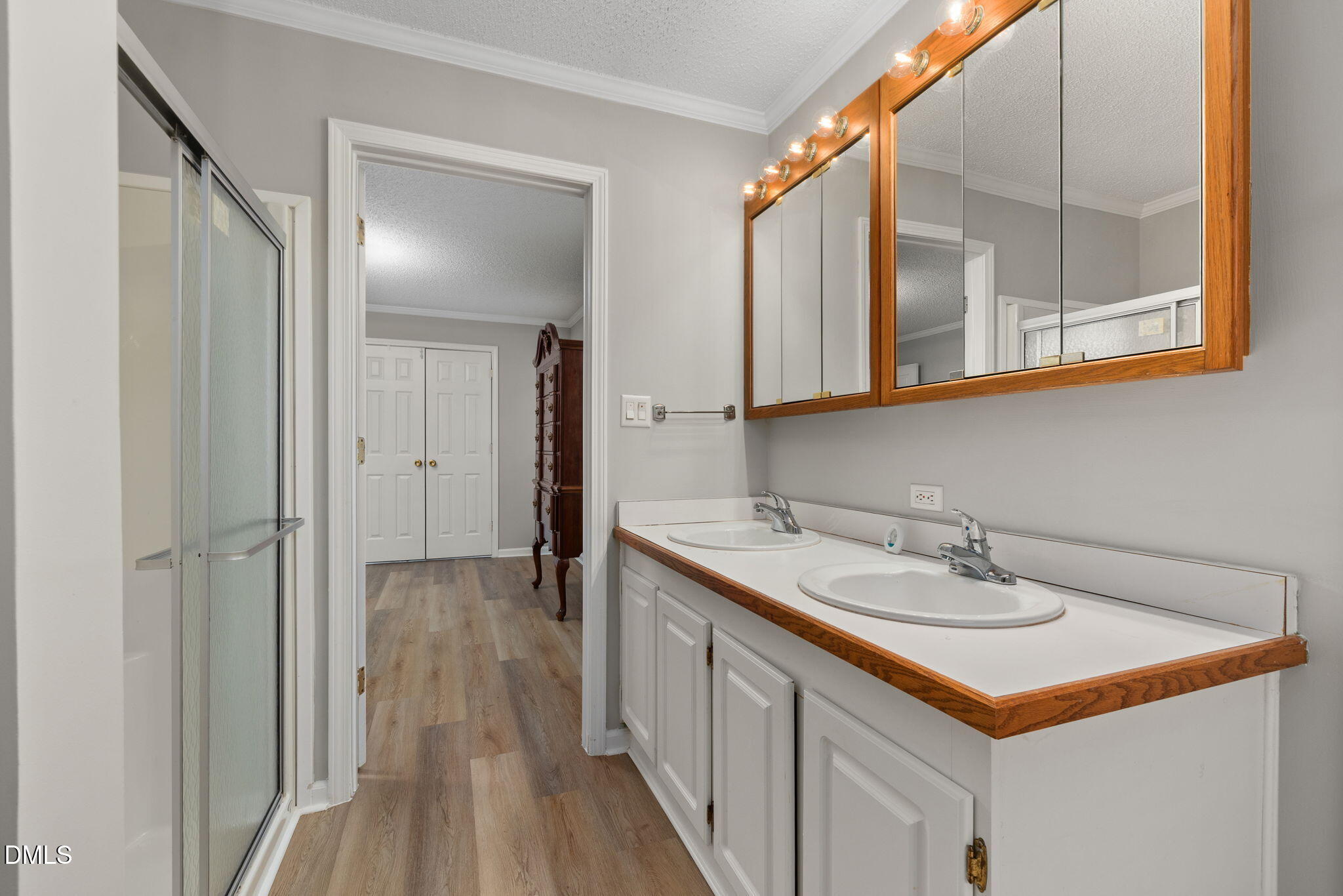 2850 Sanderford Road Raleigh, NC 27610 - Photo 22 of 34 a bathroom with a sink and a mirror