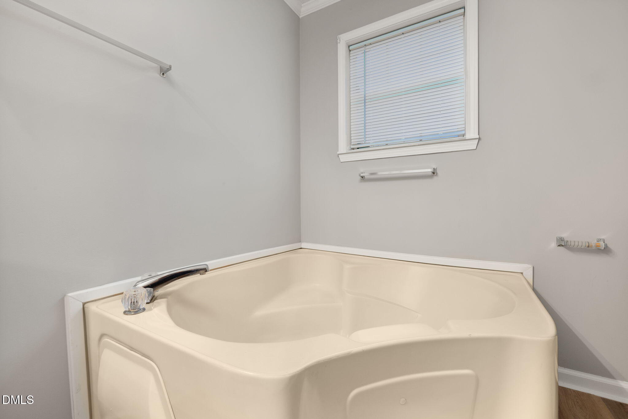 2850 Sanderford Road Raleigh, NC 27610 - Photo 24 of 34 a white bath tub sitting in a bathroom