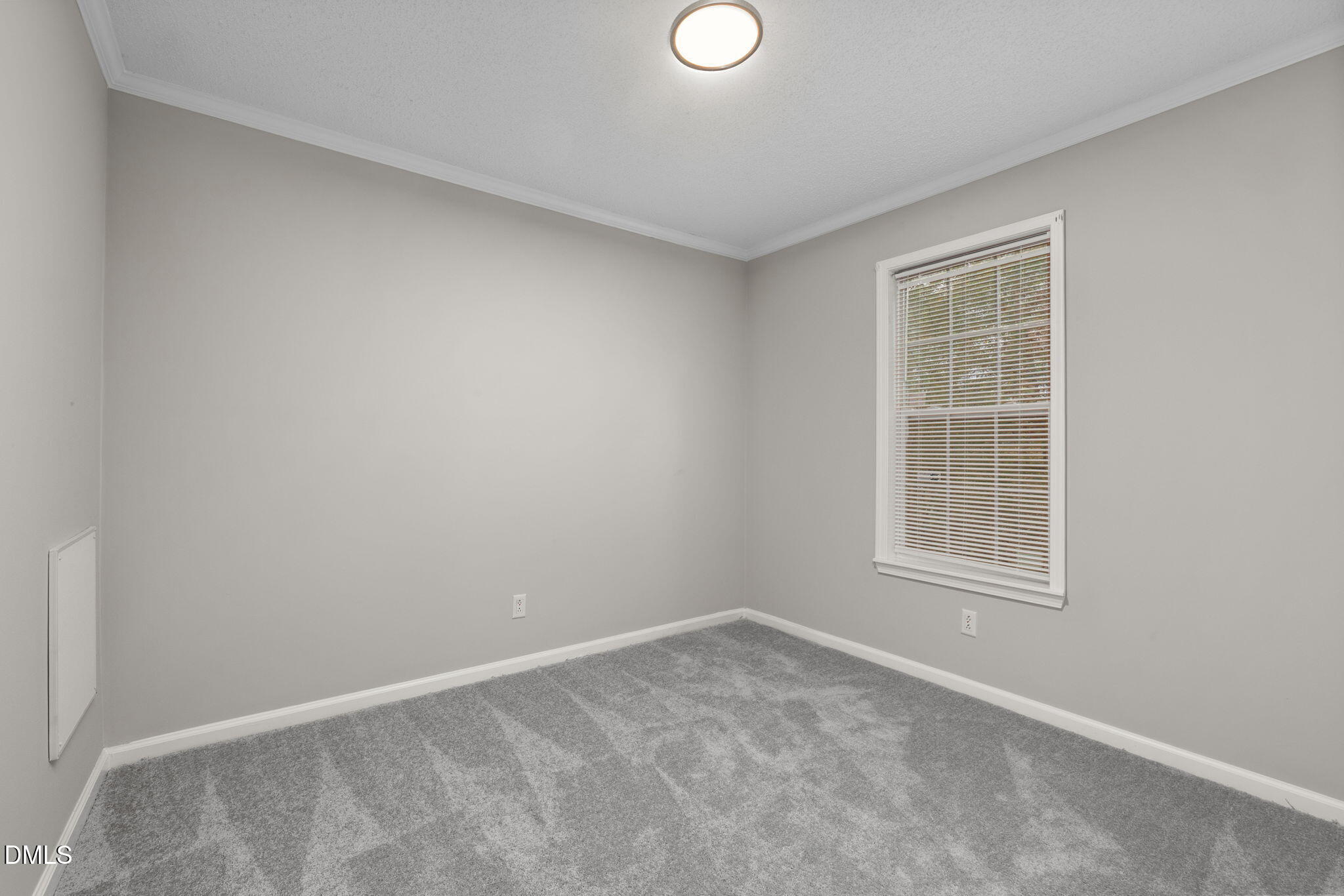 2850 Sanderford Road Raleigh, NC 27610 - Photo 29 of 34 an empty room with a window