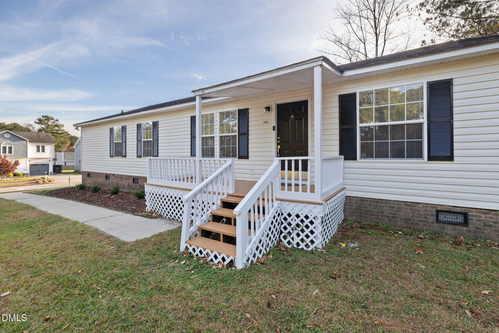 2850 Sanderford Road Raleigh, NC 27610 - Photo 8 of 34 a house view with a outdoor space