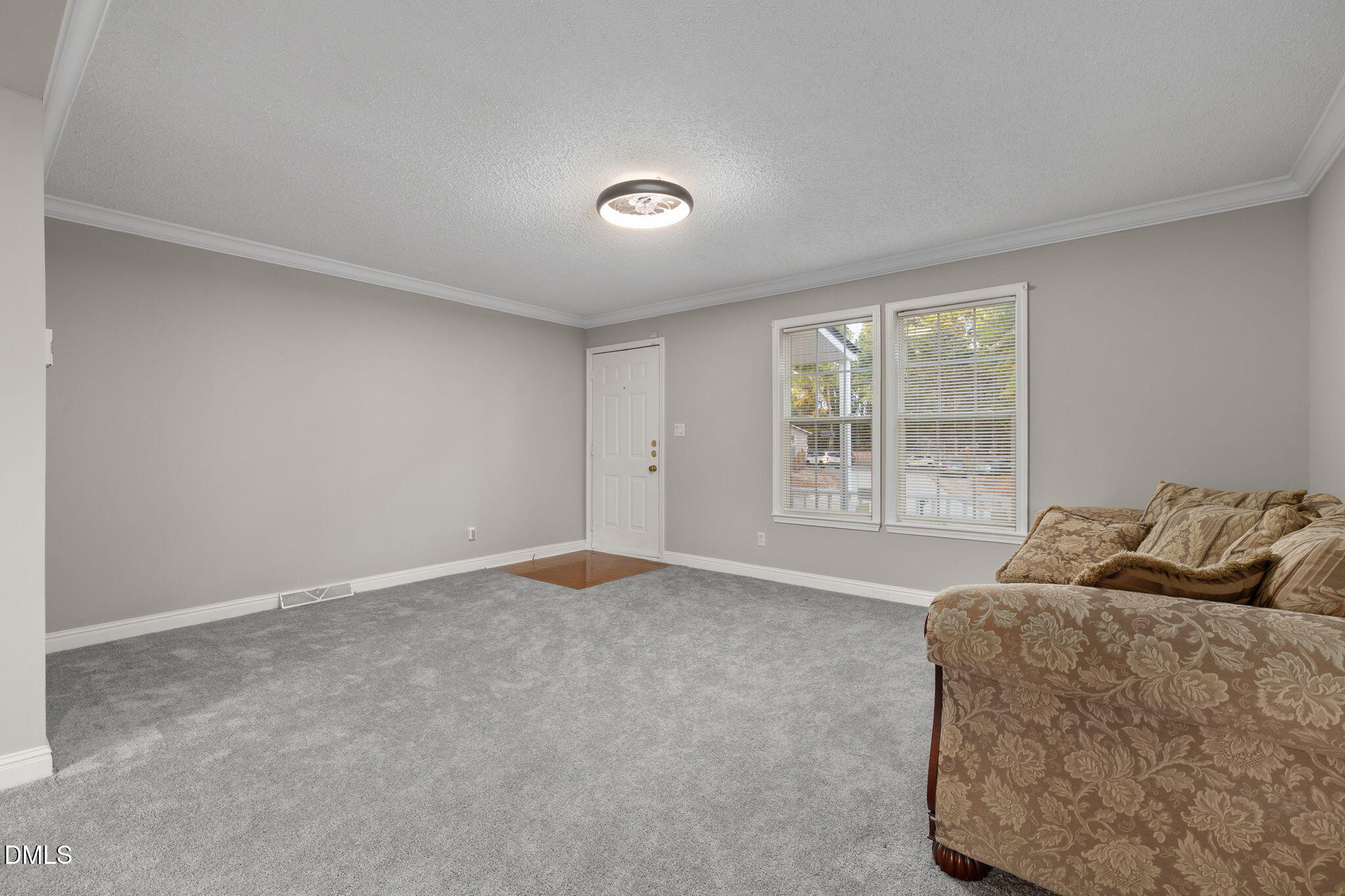 2850 Sanderford Road Raleigh, NC 27610 - Photo 10 of 34 a bedroom with bed and window