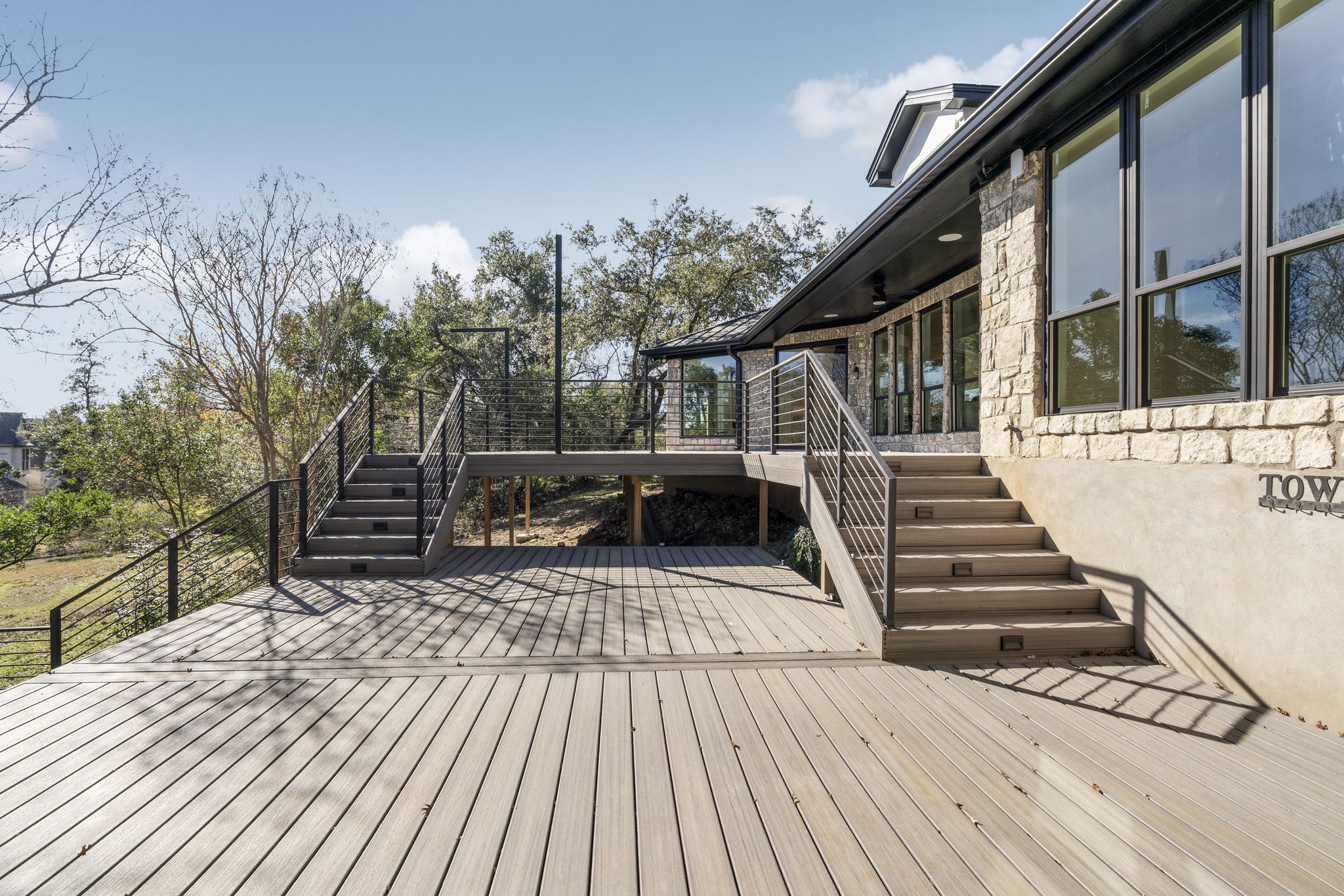 701 Furlong Drive Austin, TX 78746 - Photo 30 of 40 a view of outdoor space with wooden floor and deck