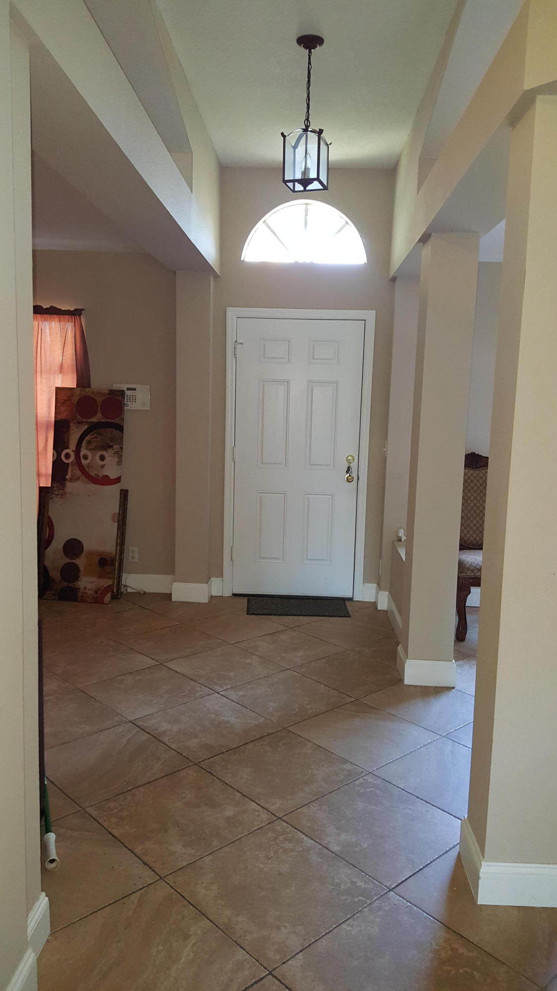 2362 Southeast Merrill Road Port St. Lucie, FL 34952 - Photo 2 of 14 SE Merrill Rd - Foyer