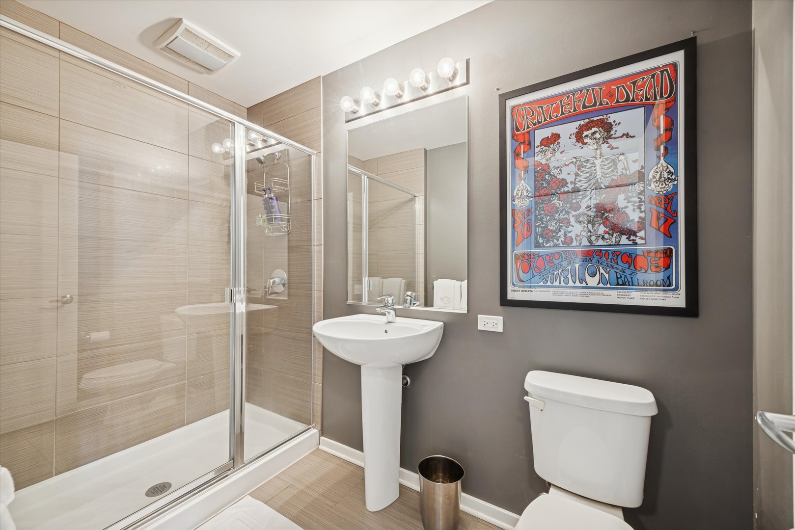 659 West Randolph Street, Unit 1401 Chicago, IL 60661 - Photo 13 of 15 a bathroom with a sink a toilet and shower