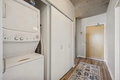 a view of bathroom with washer and dryer
