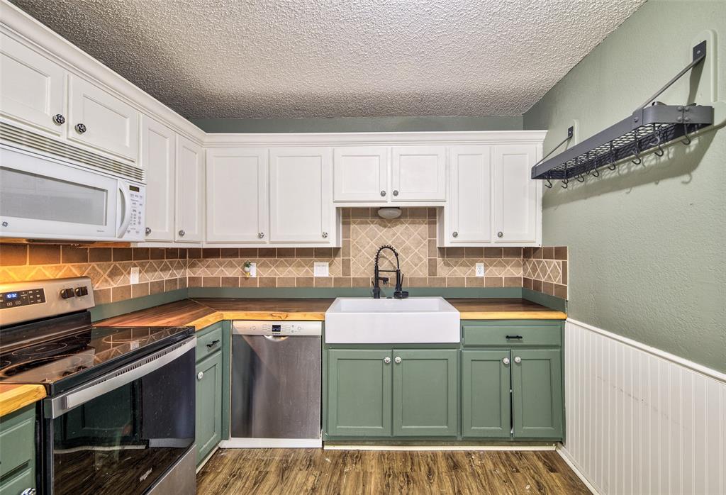 514 Gilliland Road Springtown, TX 76082 - Photo 11 of 31 Freshly updated with butcherblock countertops