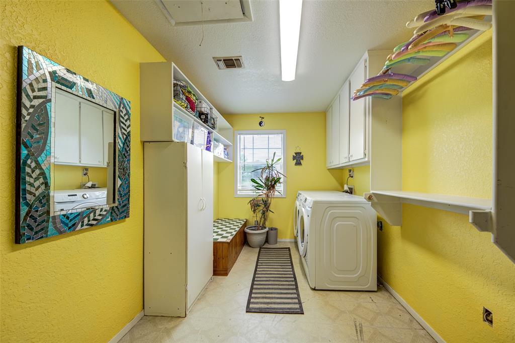 514 Gilliland Road Springtown, TX 76082 - Photo 22 of 31 Massive laundry room with lots of storage