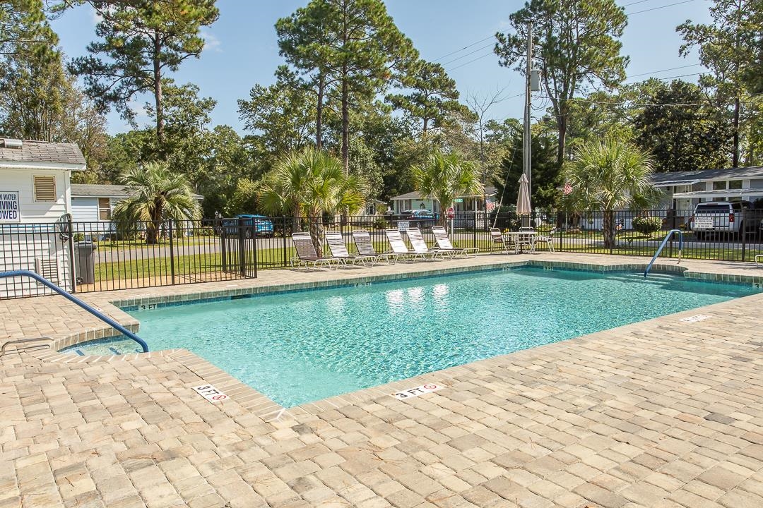 3043 Atlanta Circle Murrells Inlet, SC 29576 - Photo 33 of 36 Community pool featuring a patio