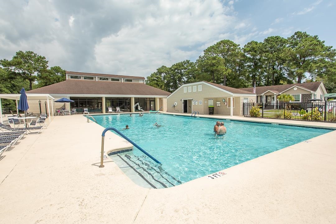 3043 Atlanta Circle Murrells Inlet, SC 29576 - Photo 34 of 36 Community pool with a patio