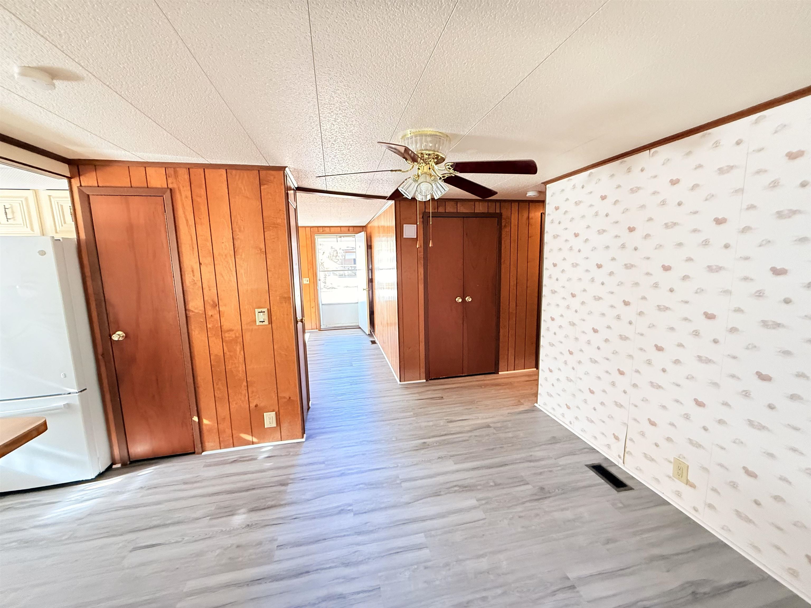 3043 Atlanta Circle Murrells Inlet, SC 29576 - Photo 8 of 36 Spare room with light wood-style flooring and a ceiling fan
