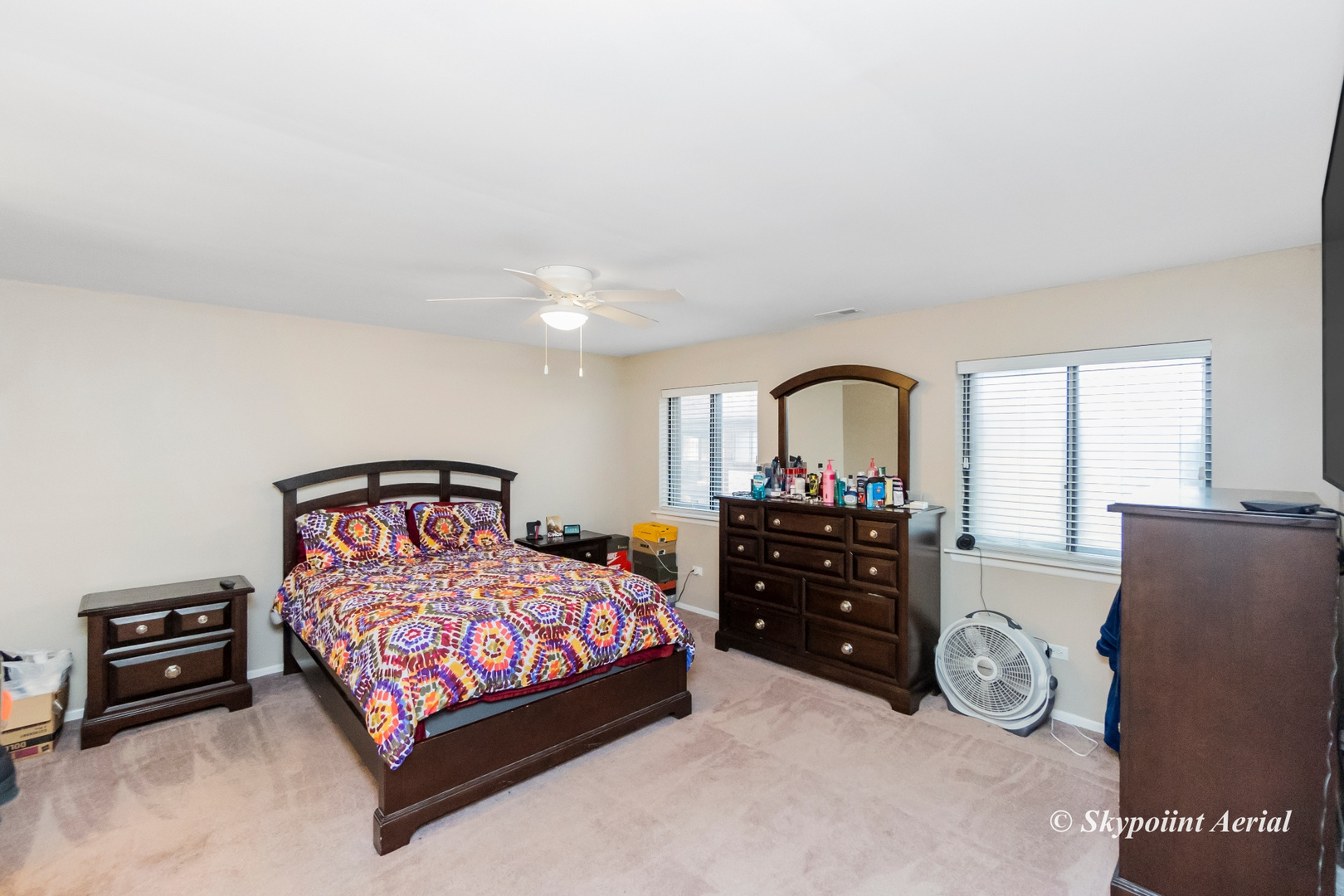 3231 West 184th Street, Unit 2B Homewood, IL 60430 - Photo 11 of 22 a bedroom with a bed and a dresser