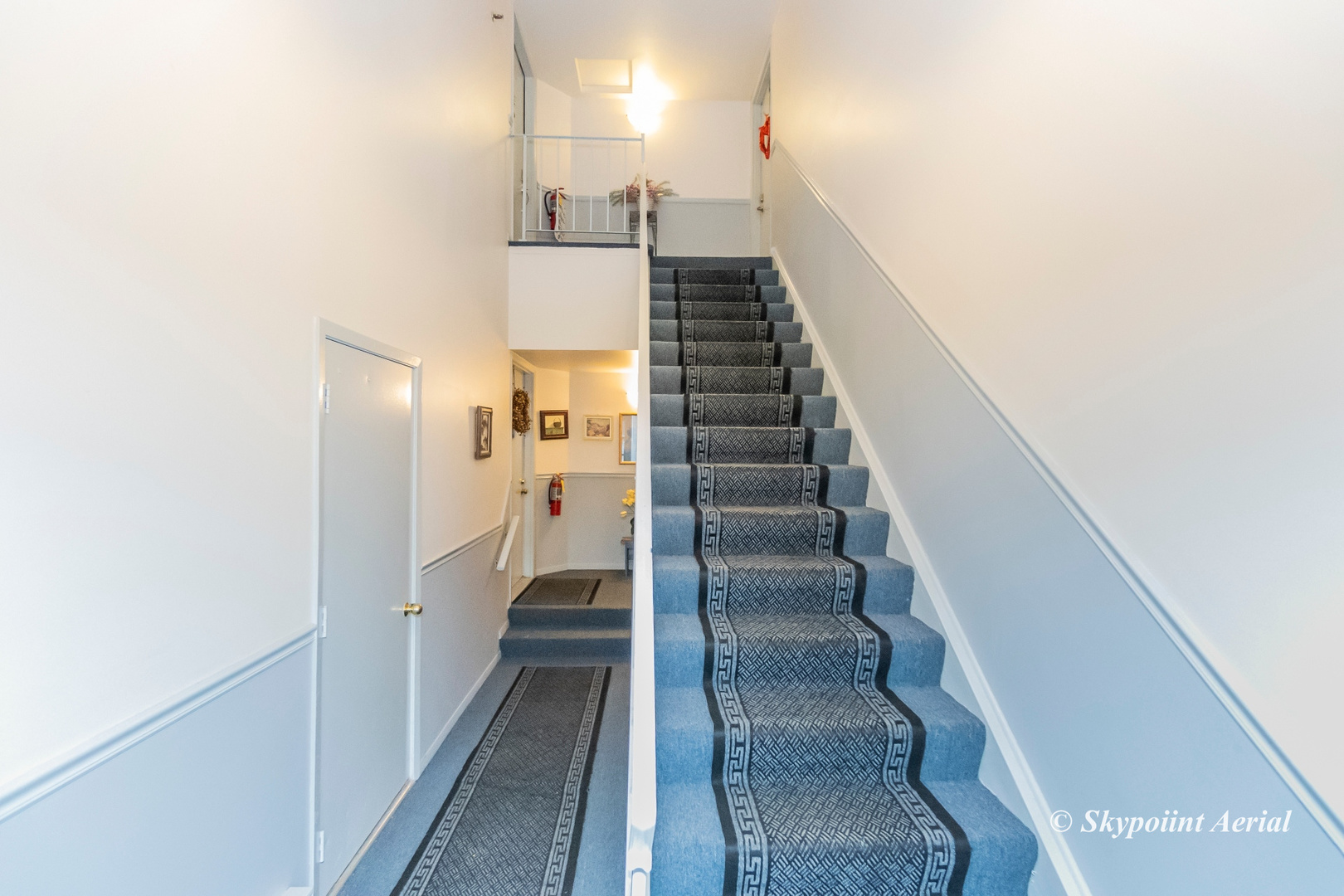 3231 West 184th Street, Unit 2B Homewood, IL 60430 - Photo 14 of 22 a view of entryway and hall with wooden floor