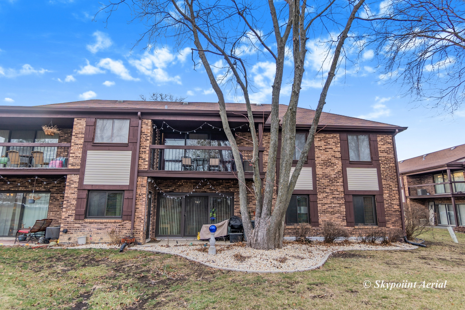 3231 West 184th Street, Unit 2B Homewood, IL 60430 - Photo 17 of 22 a view of a building with a patio