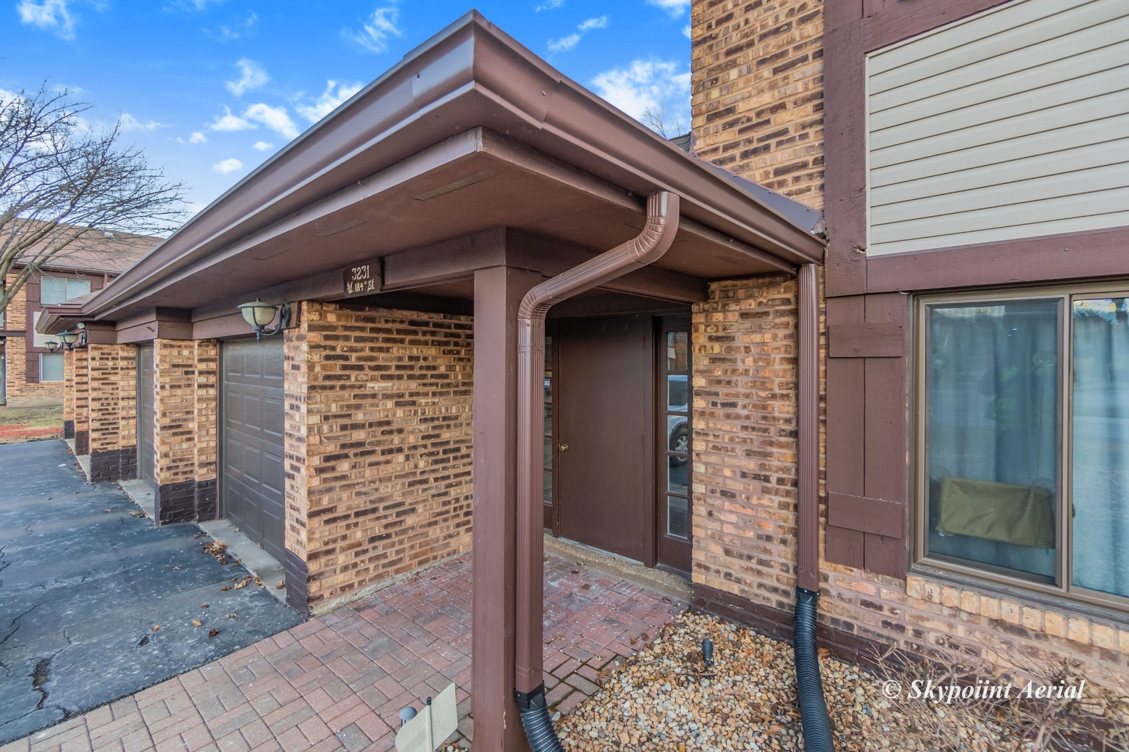 3231 West 184th Street, Unit 2B Homewood, IL 60430 - Photo 2 of 22 a front view of a house