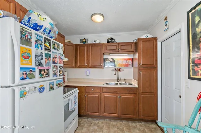 a bedroom with a bed and a chair