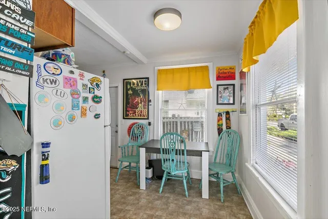 a bedroom with furniture and a chandelier