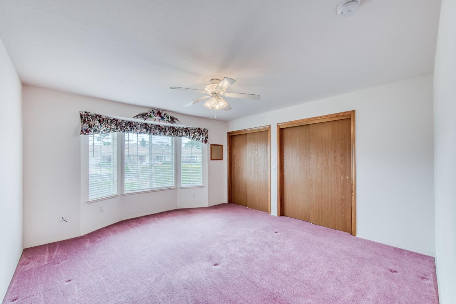 2530 Sterling Avenue Sanger, CA 93657 - Photo 35 of 40 an empty room with windows and closet