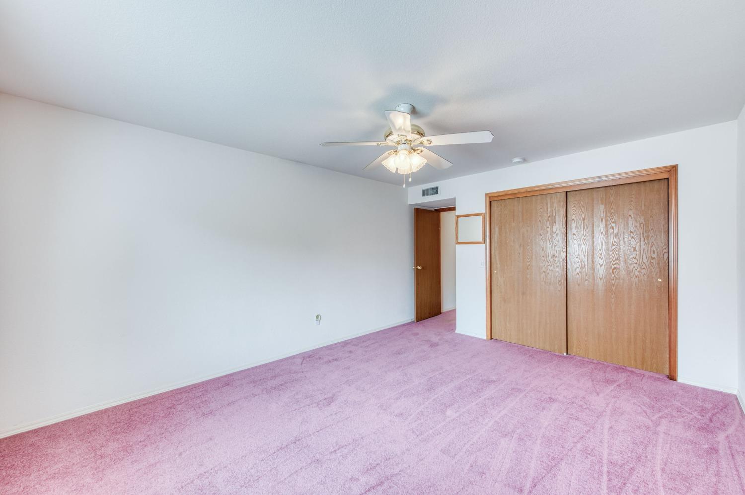 2530 Sterling Avenue Sanger, CA 93657 - Photo 36 of 40 a view of an empty room with a chandelier fan