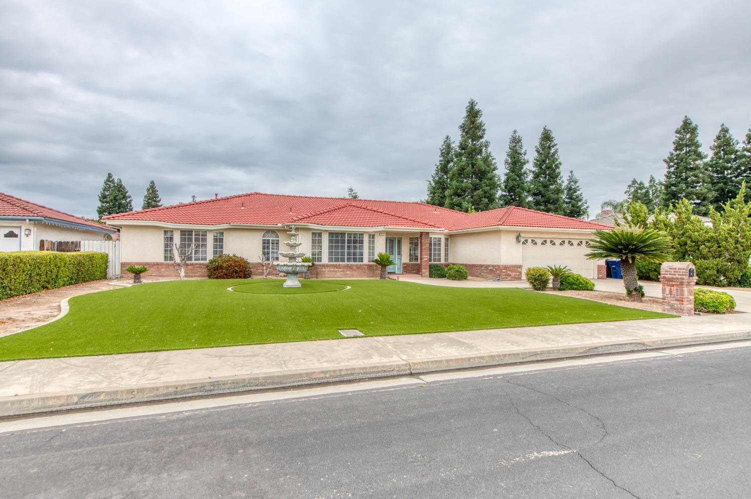 2530 Sterling Avenue Sanger, CA 93657 - Photo 40 of 40 a front view of house with yard and green space