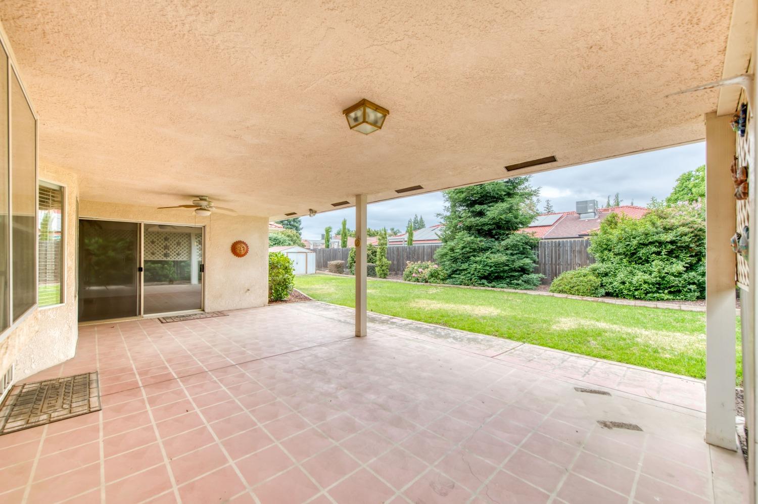 2530 Sterling Avenue Sanger, CA 93657 - Photo 6 of 40 a view of a house with a yard and garage