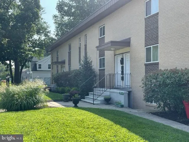 a view of backyard of a house