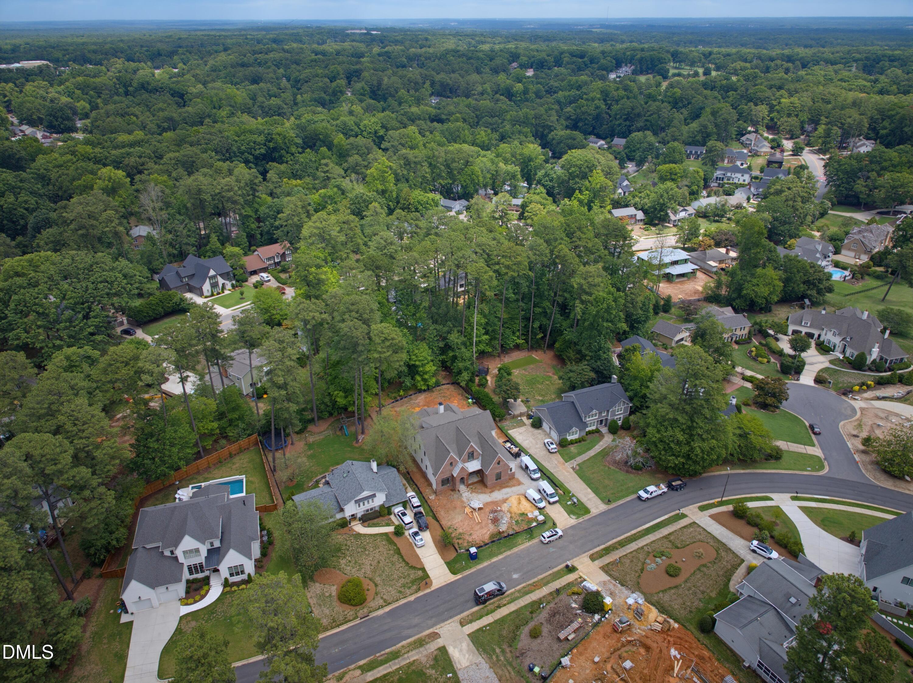 7508 Grist Mill Road Raleigh, NC 27615 - Photo 30 of 32 an aerial view of a house with a yard