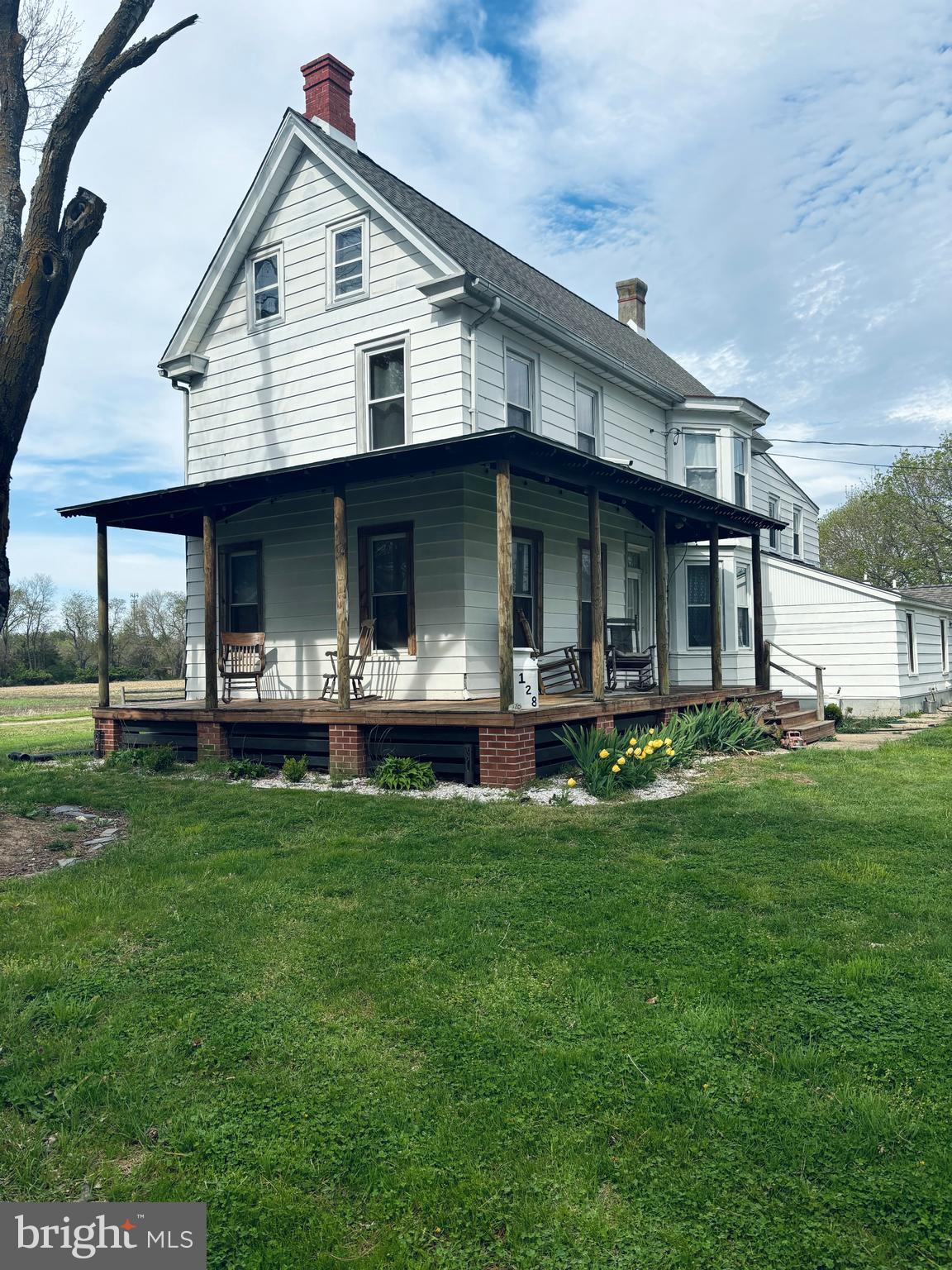 a front view of house with yard