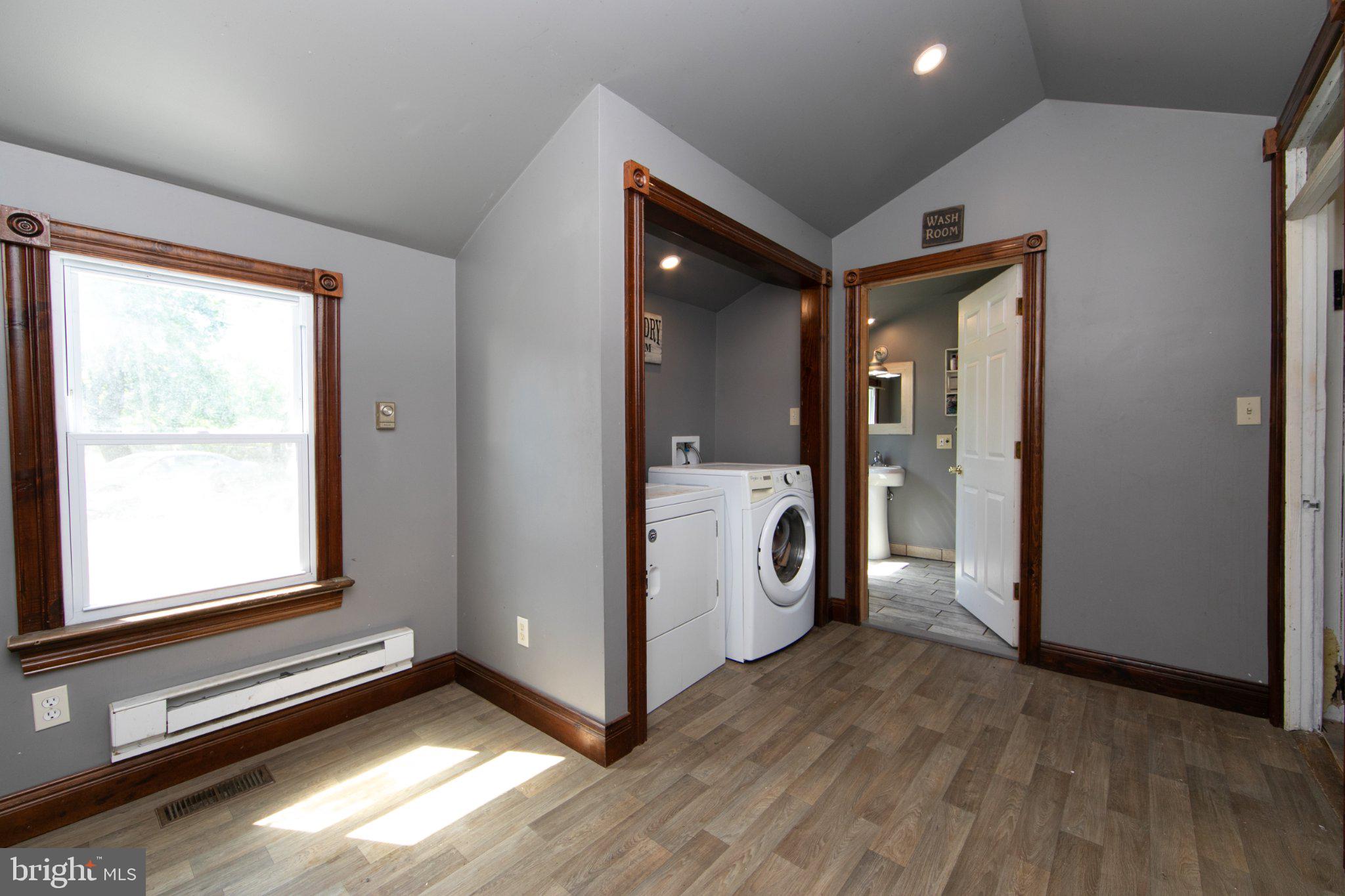 128 Jefferson Road Elmer, NJ 08318 - Photo 17 of 47 a view of a hallway with washer and dryer