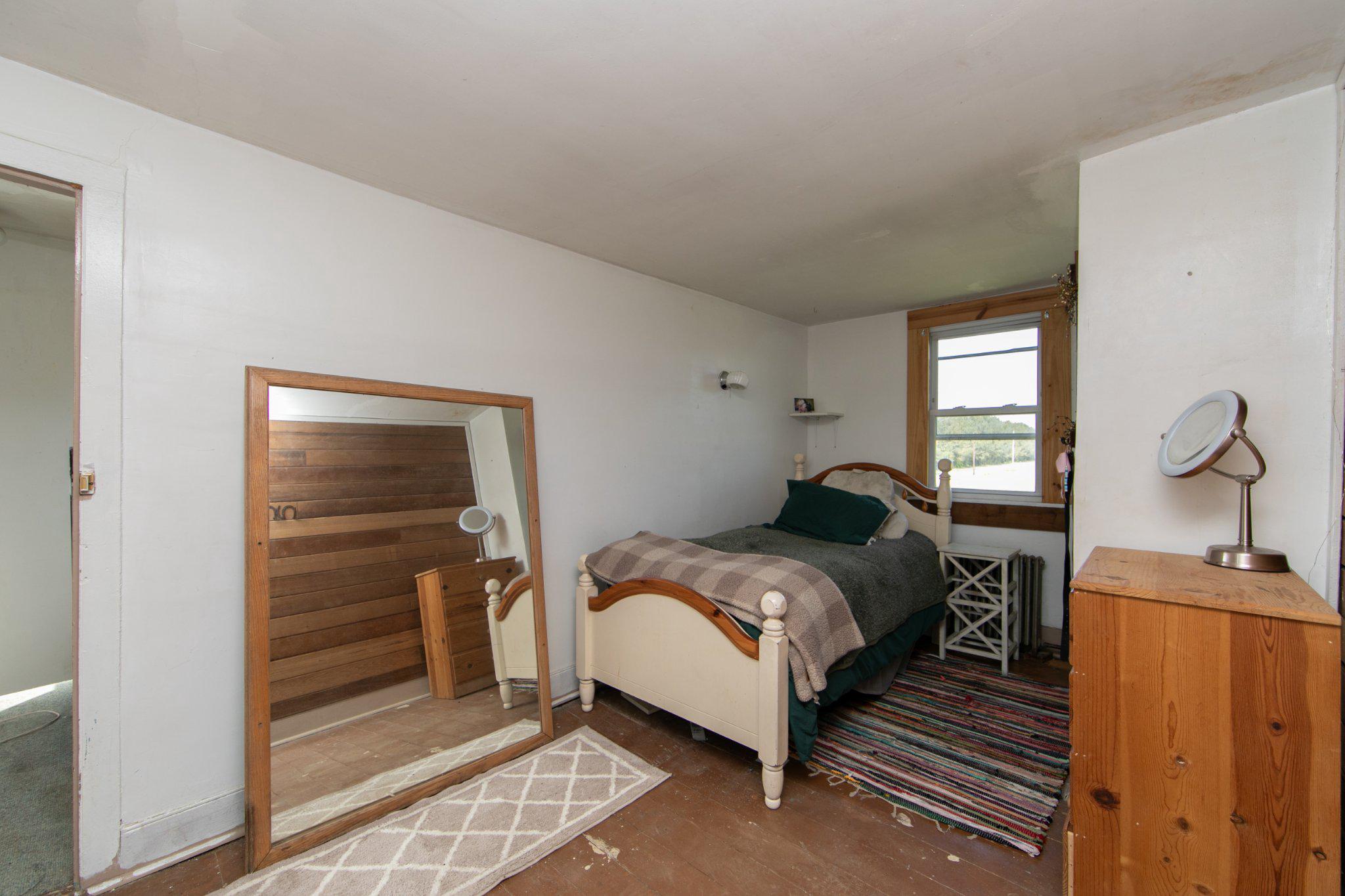 128 Jefferson Road Elmer, NJ 08318 - Photo 19 of 47 a bedroom with a bed and a dresser
