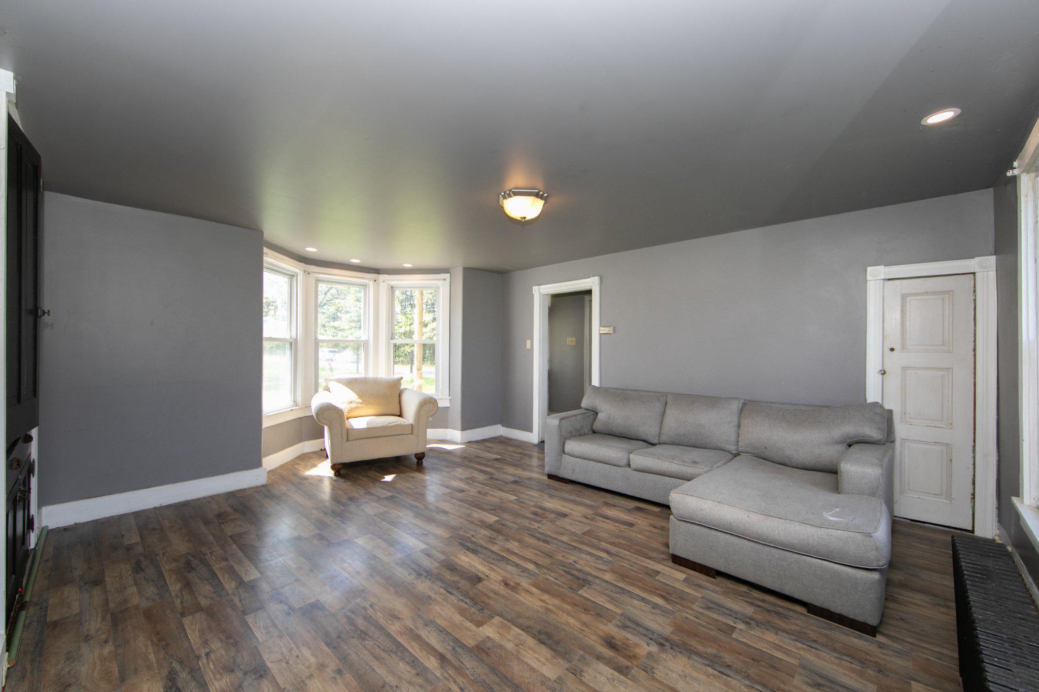 128 Jefferson Road Elmer, NJ 08318 - Photo 7 of 47 a living room with furniture and a large window