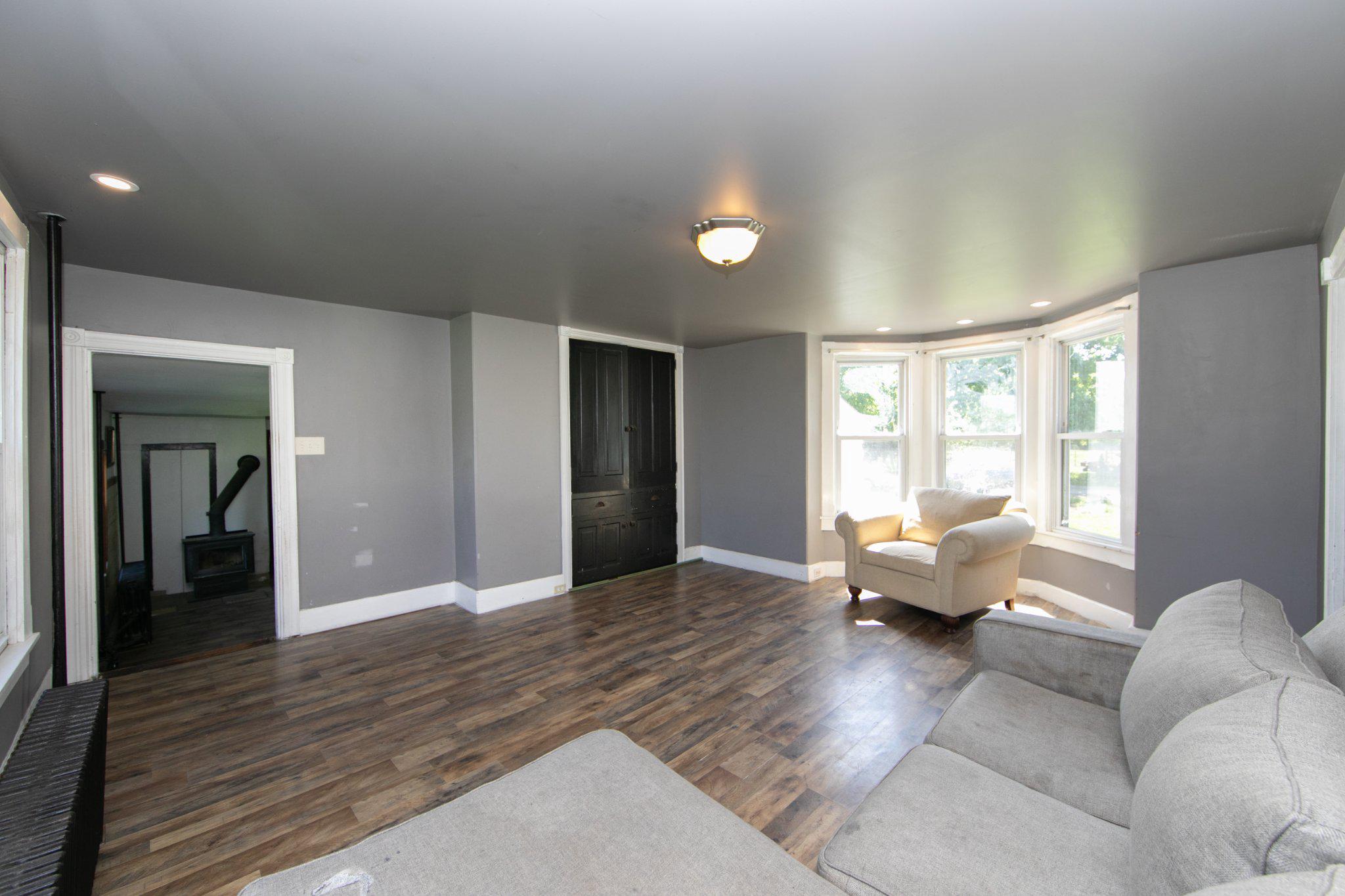 128 Jefferson Road Elmer, NJ 08318 - Photo 8 of 47 a living room with furniture window and wooden floor