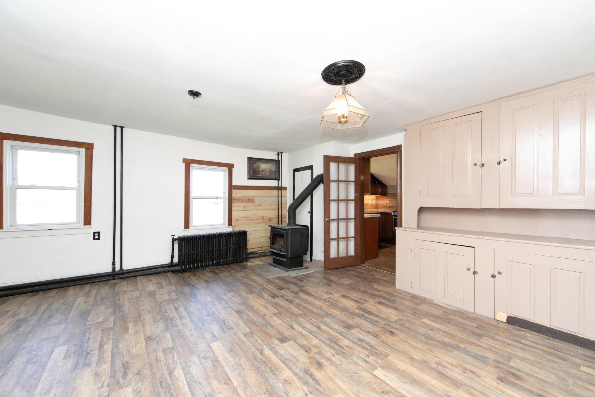 128 Jefferson Road Elmer, NJ 08318 - Photo 10 of 47 a kitchen with a refrigerator and a stove