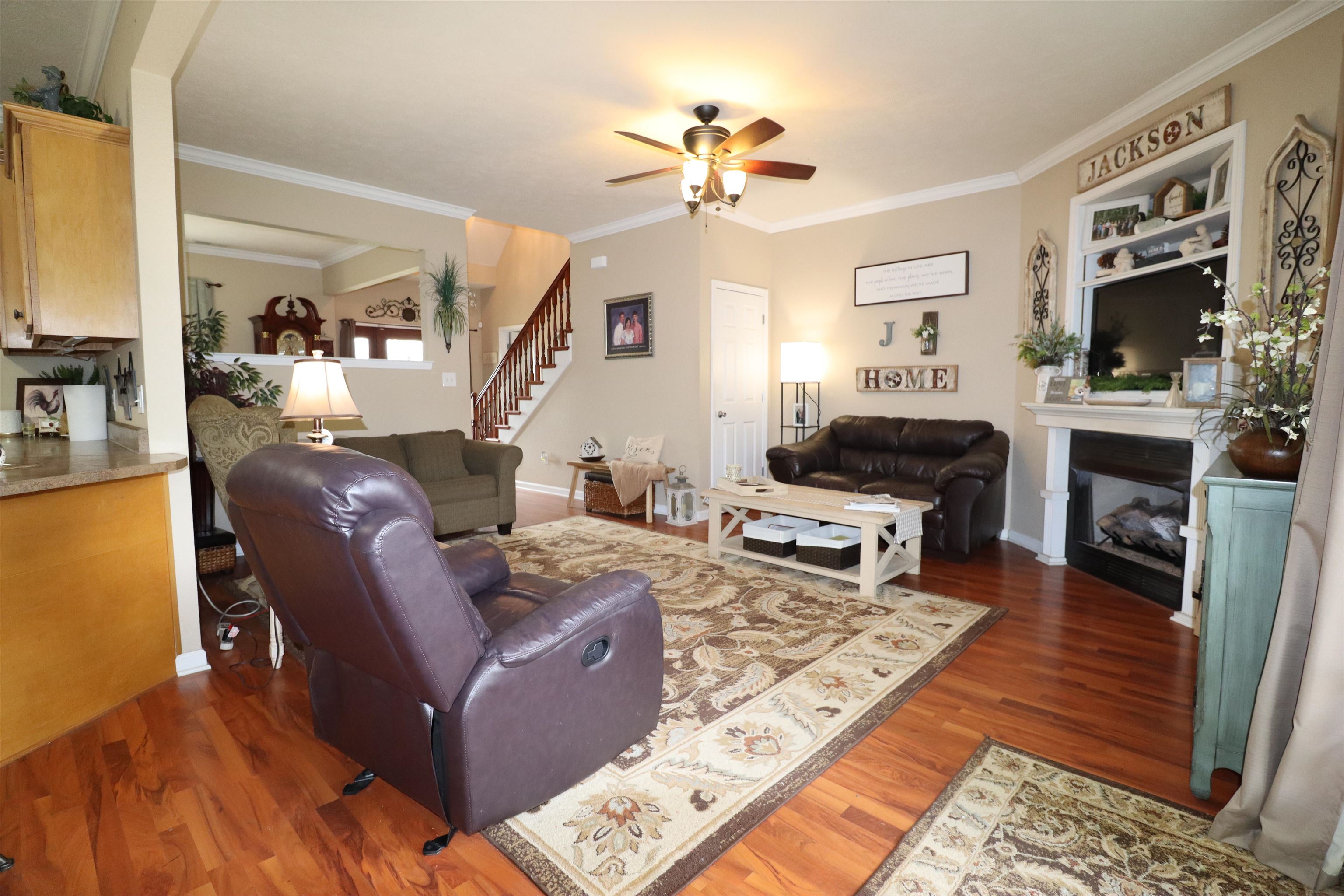730 Durhamville Road Ripley, TN 38063 - Photo 14 of 40 a living room with furniture fireplace and a flat screen tv